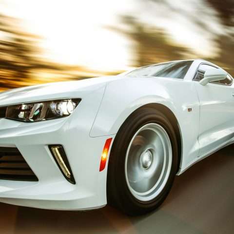 Photo by Jesse Zheng: https://www.pexels.com/photo/close-up-photography-of-white-chevrolet-camaro-1213294/